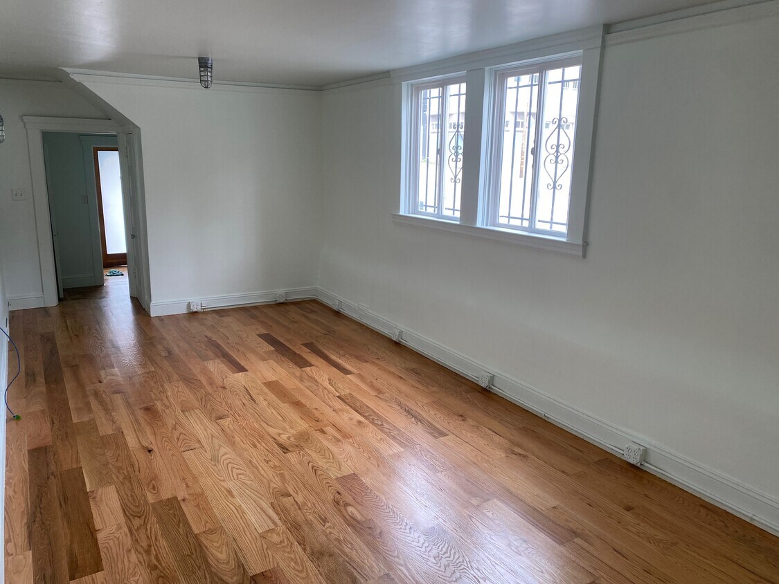 Living room and work space with lots of power outlets. - 2101 23rd St