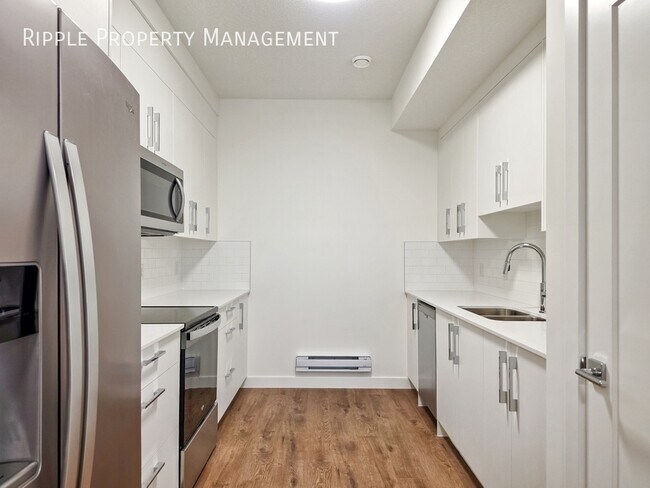 Photo du bâtiment - BRAND NEW 1 BED, 1 BATH BASEMENT SUITE | PRIVATE ENTRY & HIGH-END FINISHES