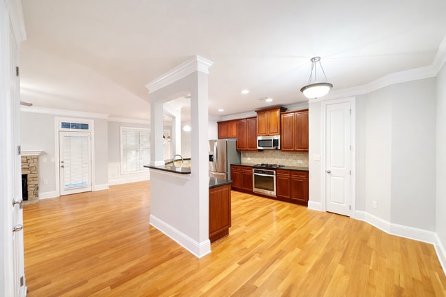 Building Photo - Gated Johns Creek Townhome Offering Space, Privacy, and Everyday Convenience