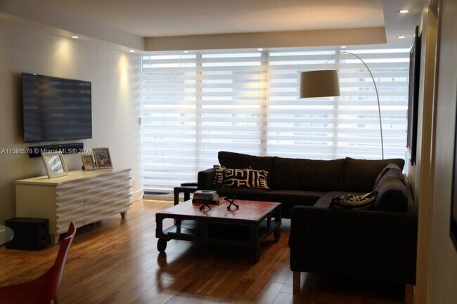 Building Photo - 8911 Collins Ave