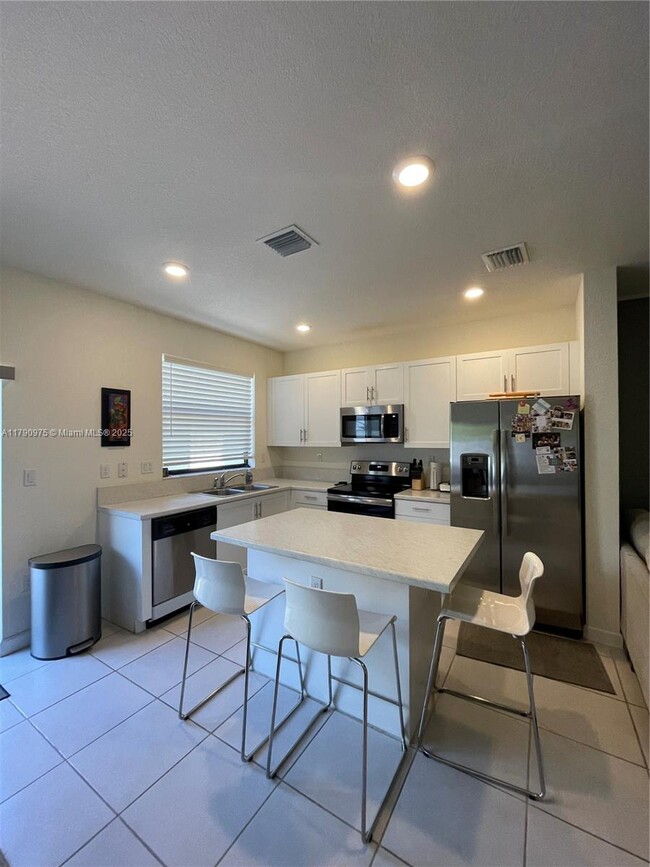 Building Photo - 10586 West 33rd Ct