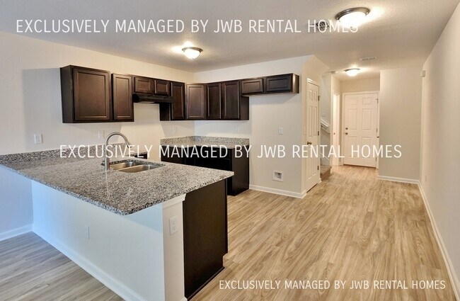 Building Photo - 8487 McGirts Village Ln
