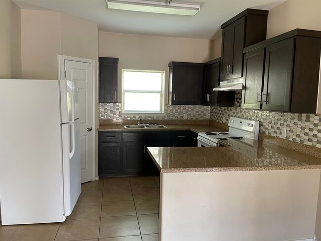 Building Photo - 5402 Marcella Ave