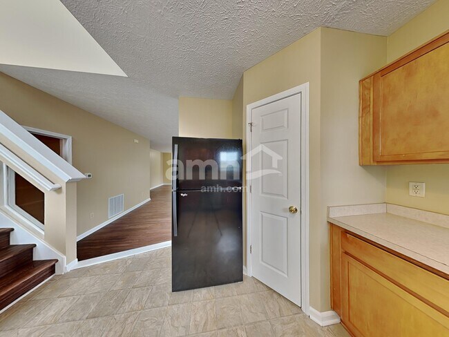 Building Photo - 6591 W Irving Dr