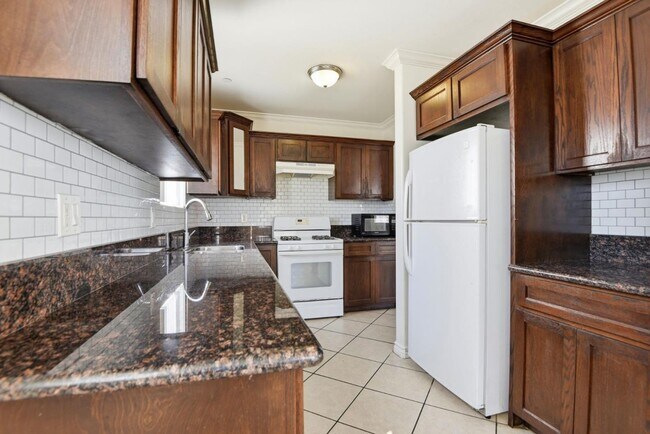 Foto del edificio - 1614 W 39th Pl