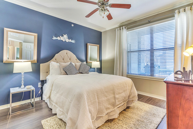 Large Master Bedroom with Lots of Natural Light and hard wood floors - Aspire Mckinney Ranch