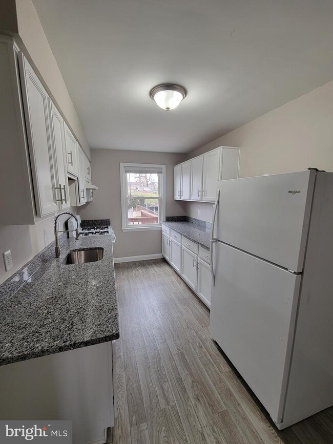 Building Photo - 4635 Wilkens Ave