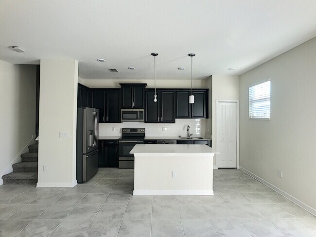 Foto del edificio - Spacious 3-Bedroom Townhouse Retreat in Kissimmee – Modern Comfort!