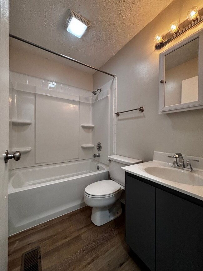 Building Photo - Charming 2-Bed, 1.5-Bath Condo with Carpor...