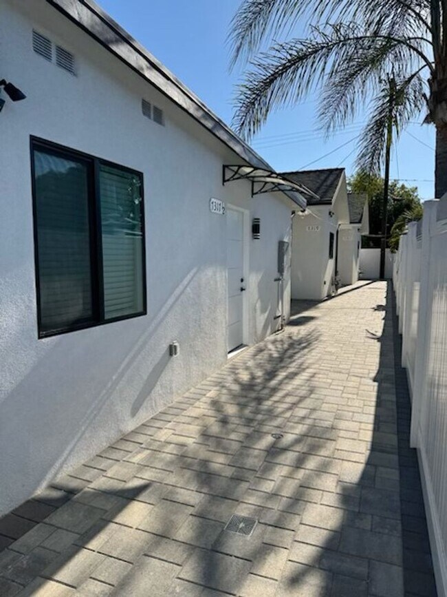 Building Photo - 7317-7321 Garden Grove Ave