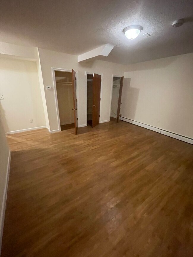 Building Photo - Large studio with utilities included.