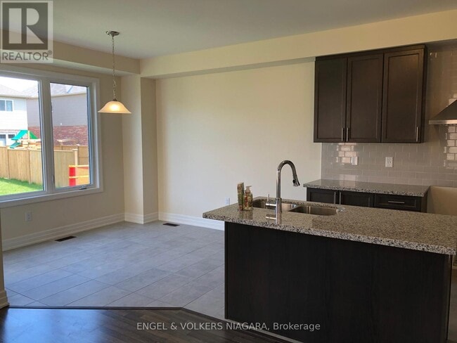 Building Photo - 9570 TALLGRASS Ave