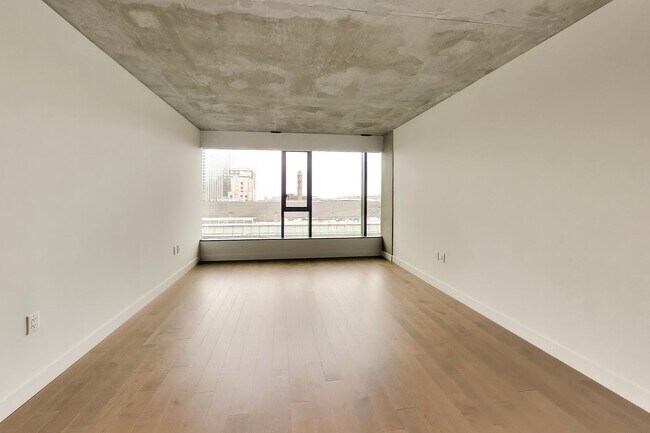 Building Photo - Urban Luxury at SoMa Serif Condos 2BR/2BA | In-Unit Laundry & 24-Hour Security