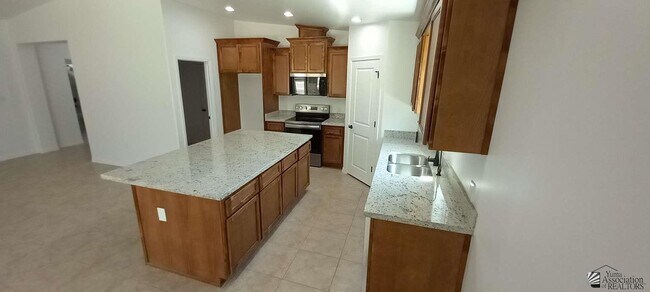 Foto del edificio - 12624-12651 E 51st St