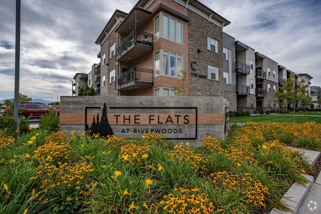 Building Photo - The Flats at Riverwoods