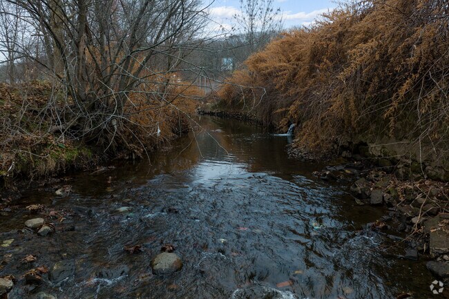 A babbling brook runs under the main road of Meriden.