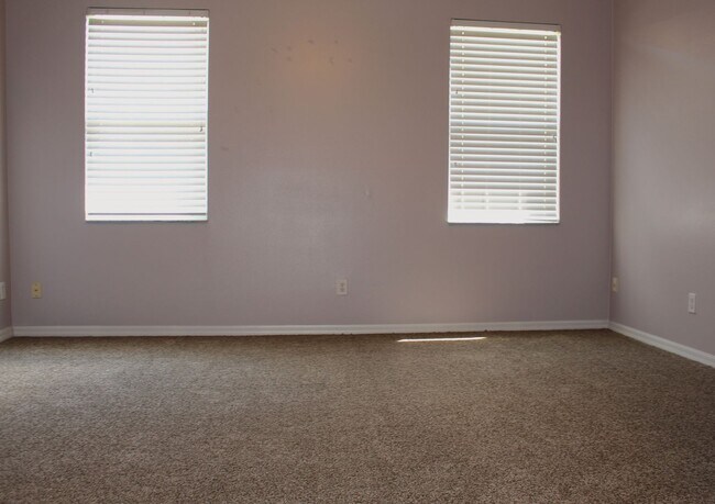 Building Photo - Freshly painted, four bedroom home availab...