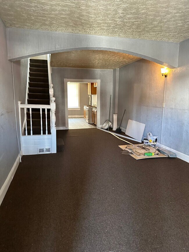 Building Photo - Spacious Rooms! Partially Finished Basemen...
