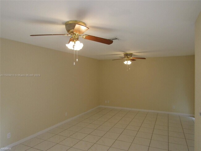 Building Photo - 3 br, 2.5 bath House - 10944 Neptune Dr # 0