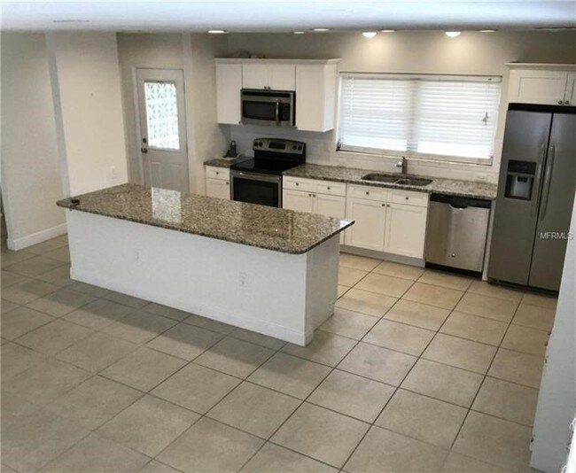 Building Photo - 6916 Alderwood Dr