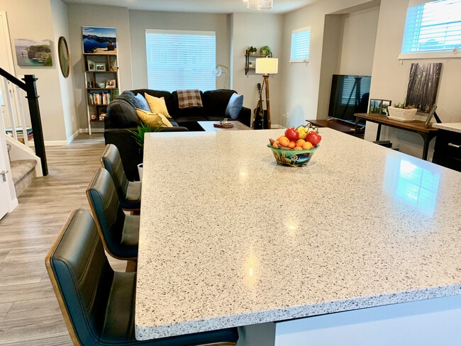 Open layout first floor with large eat in kitchen - 5514 Spring Tide Way