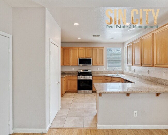 Building Photo - "Spacious 4-Bedroom Retreat on Arrow Stone...