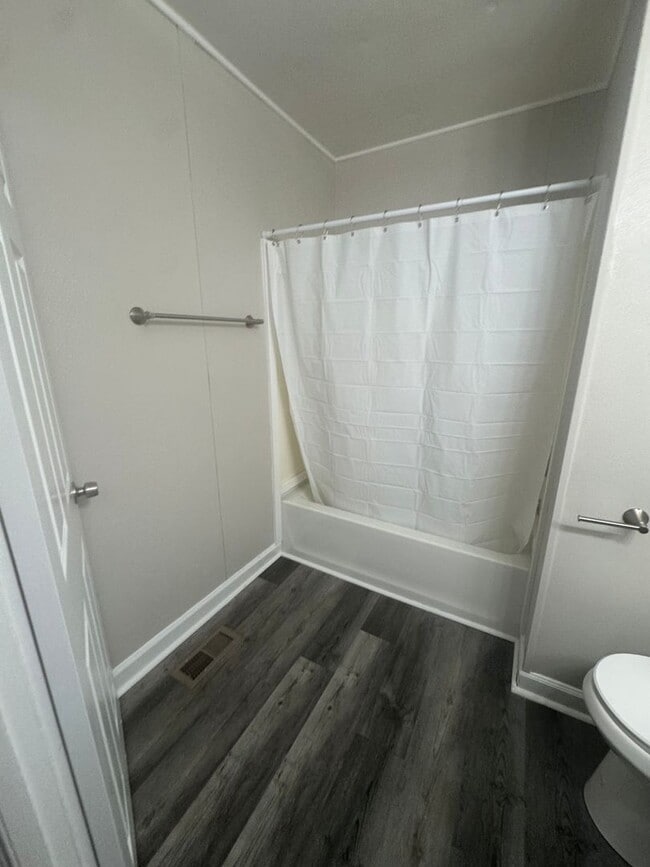 Building Photo - Cute two bedroom house with hardwood floor...