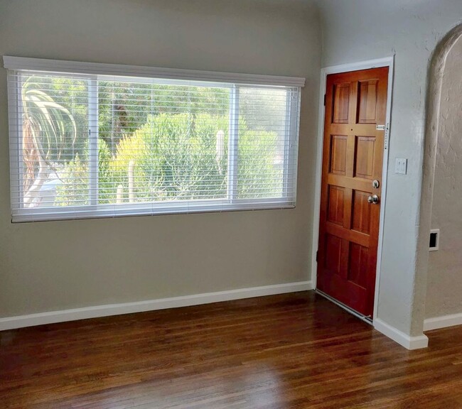 Your Living Room's Beautifully Refinished Hardwood Floors - 1828 S Curson Ave