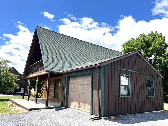 Building Photo - CONTRACT PENDING!! Charming A-frame single...