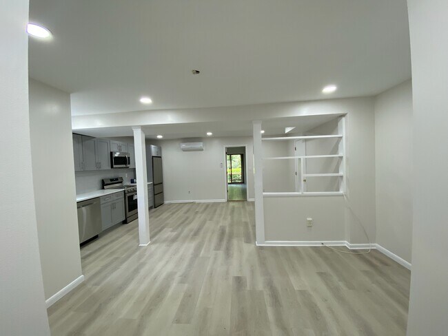 Open Floor plan with recessed lighting - 1 Hunt Club Ln