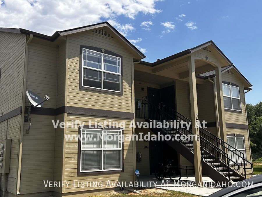 Primary Photo - Upstairs with covered parking, large bath,...