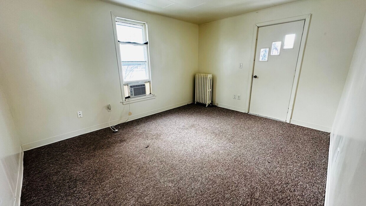 Building Photo - Key Investments-1305 N. State St.
