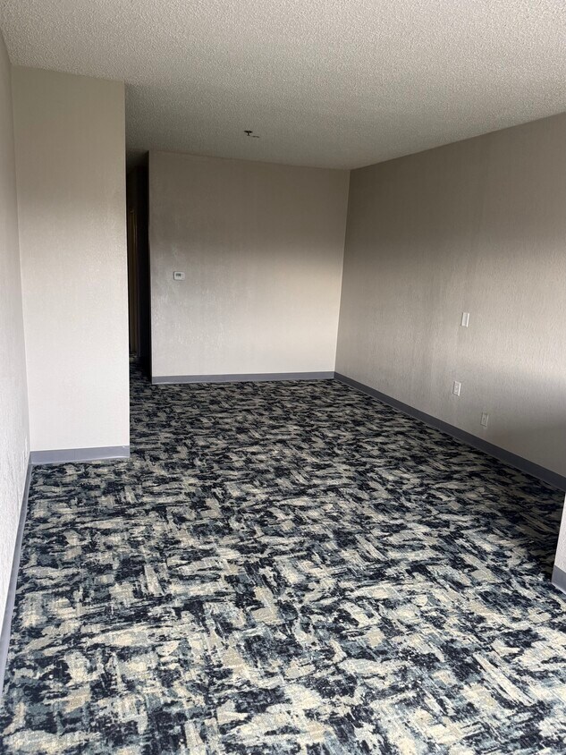 SALA DE ESTAR - Riverbluff Senior Living Apartments