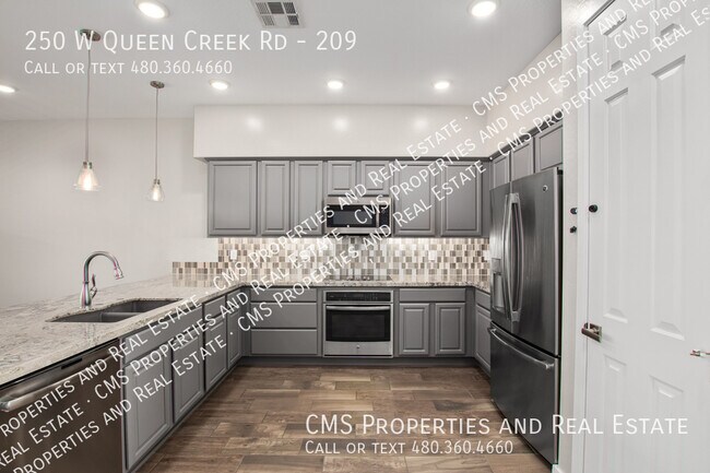 Building Photo - Gated 2 bed 2 bath Condo with Attached Garage