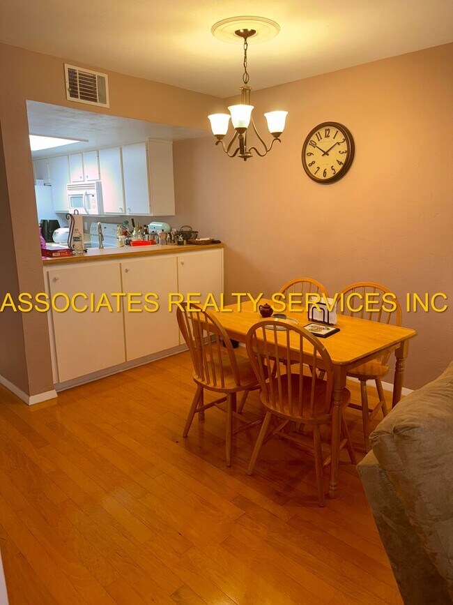 Building Photo - Partially Furnished 2-Bedroom Condo with D...