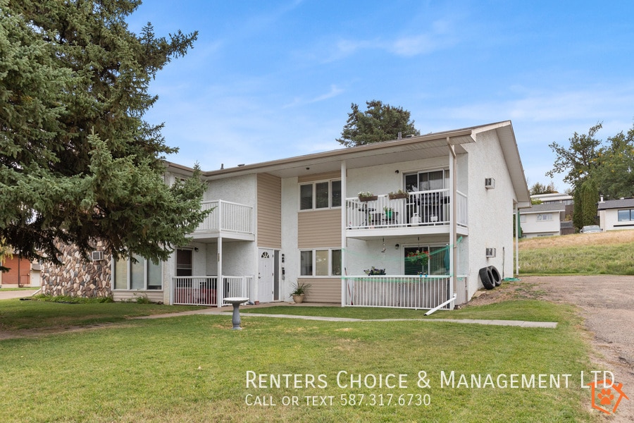 Primary Photo - Top Floor Unit, Assigned Parking, Onsite L...