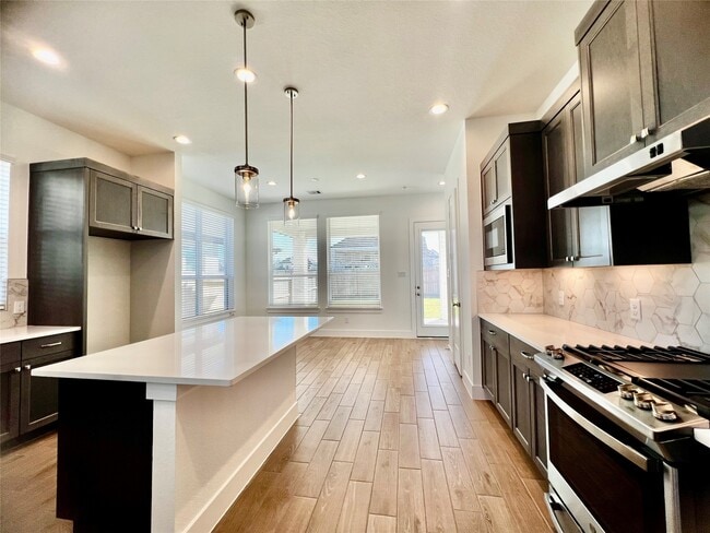 Foto del edificio - 10638 Blossom River Dr