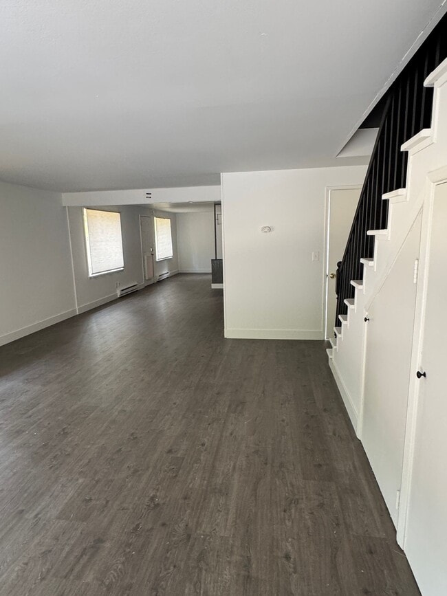 Building Photo - Spacious Two Story (2BR/1BA) Home with Large Fenced-In Yard