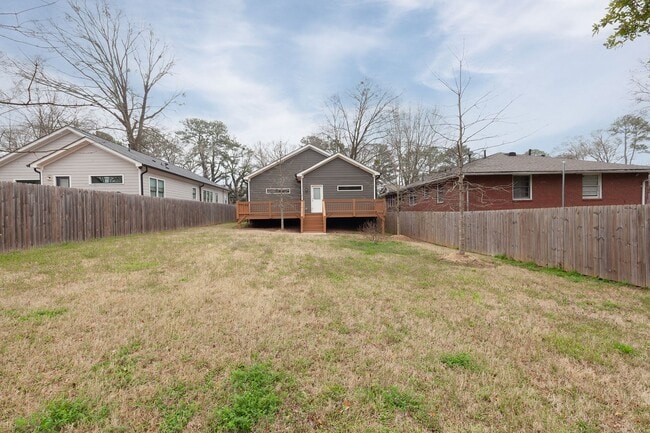 Photo - Conveniently Located 4bd/3ba Home Minutes From ATLBeltLine w/ Private Backyard!