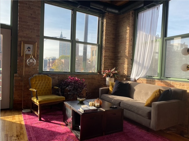 Living room w/ view of Robey Hotel - 1701 N Damen Ave