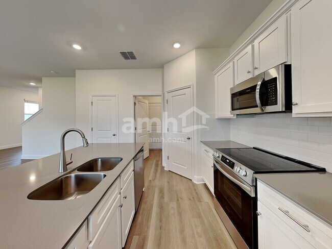 Foto del edificio - 5998 Pinewood Ests Dr