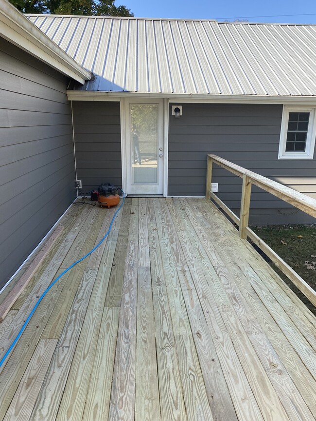 New back deck in build progress - 415 Wayne Duke Rd