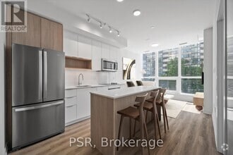 Building Photo - 4235-4235 Confederation Pkwy