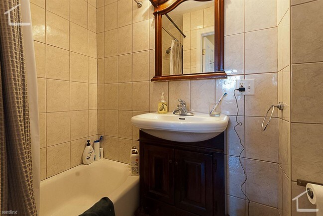 Foto del edificio - 4 br, 2 bath Condo - 150 Amory St 1