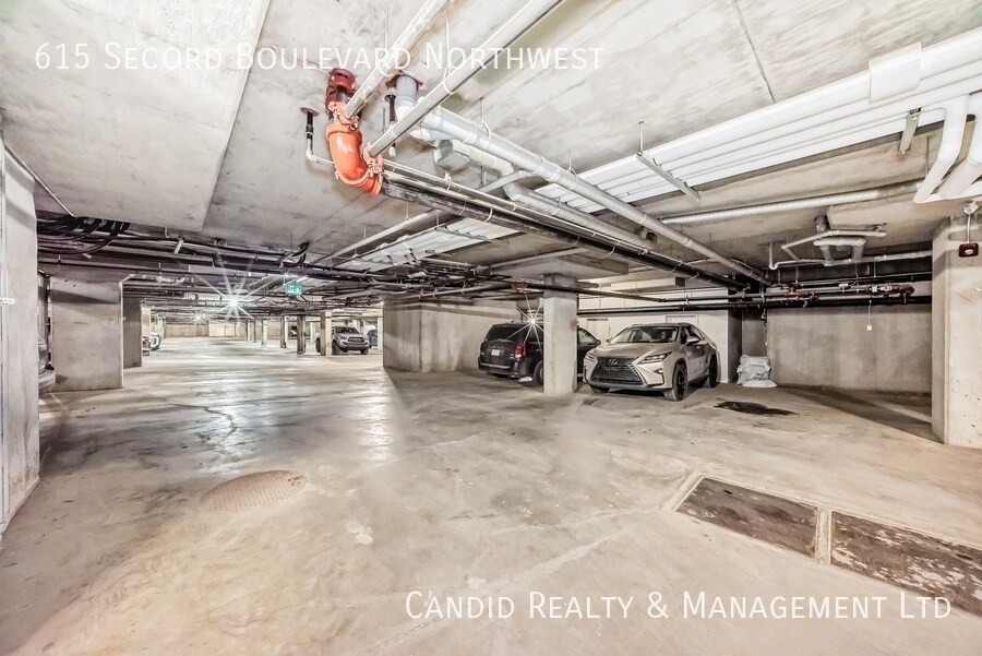 Photo du bâtiment - Modern 2 Bed, 2 Bath Condo with Undergroun...