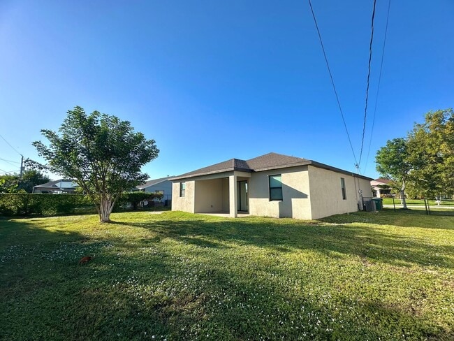Building Photo - Fenced 3 Bed 2 Bath in SW Cape Coral Avail...