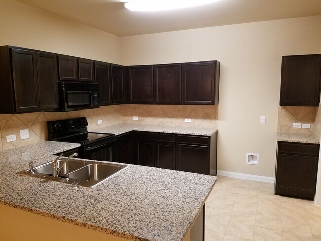 Building Photo - 5905 Montrelia Dr