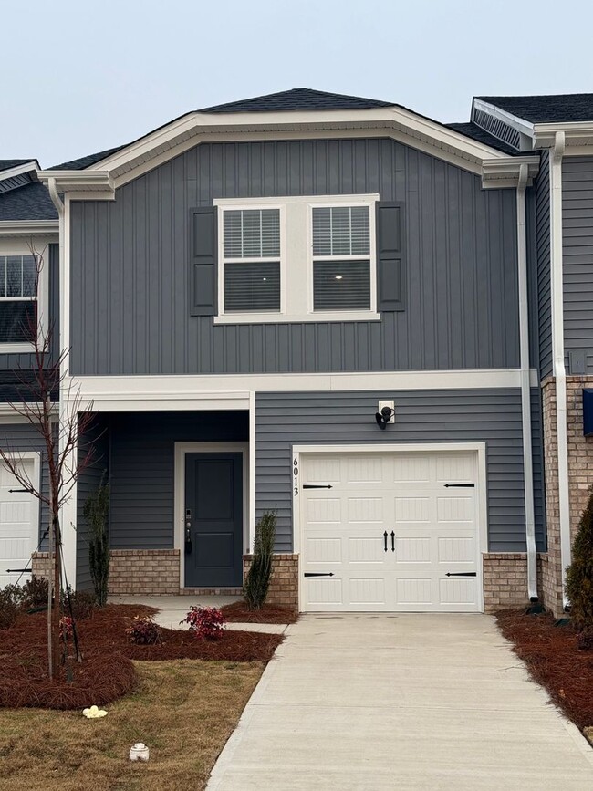 Building Photo - Brand New Townhome Available January 1st