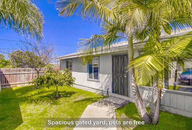 Disfrute de un amplio espacio para relajarse y jugar en un patio espacioso. - 1279 Granger St