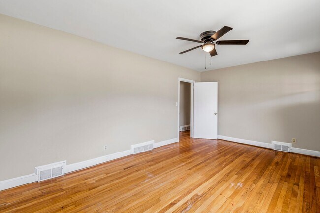 Building Photo - Large Renovated Ranch Home, Two Kitchens & Two Living Areas, Hardwood Flooring, Deck, Fenced!